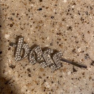 Boss hair clip by Guess